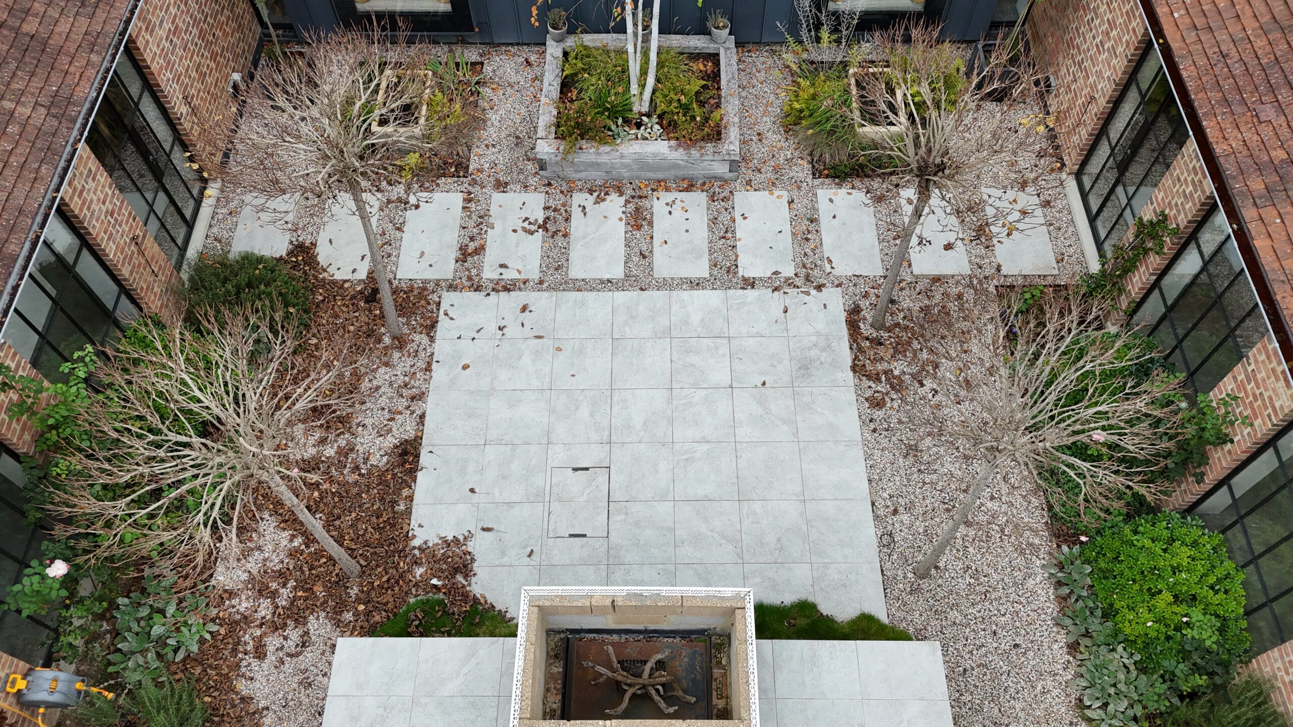 A before pic of the courtyard at The Piggeries